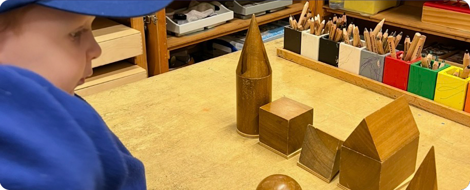 Child playing with wooden blocks